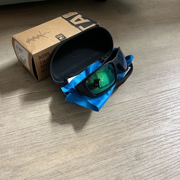 Costa Polarized Black Sunglasses with Green Lenses